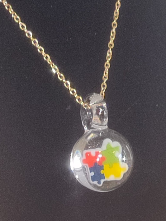 Autism Awareness Puzzle Piece Glass Pendant Necklace - by Christian Meehan